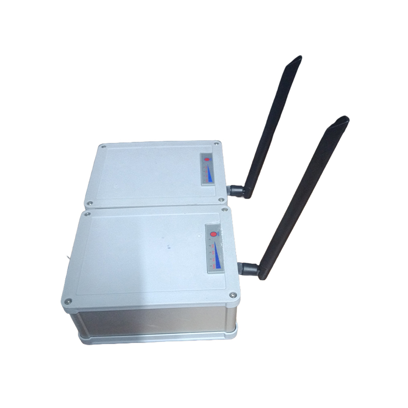 How can we reduce electromagnetic interference from wireless communication bridges through power control?